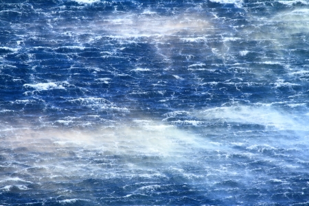 Raging sea with furious waves and fierce windの写真素材
