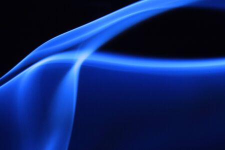 Blue smoke in black background