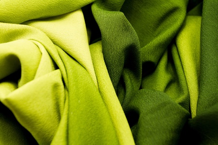 Green satin textile background  close up の写真素材