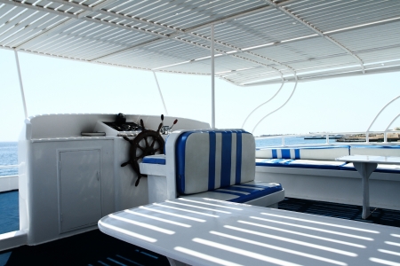 Instrument panel and steering wheel of a motor boat cockpit