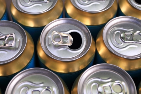 Much of yellow drinking cans close upの写真素材