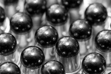 Gun bullets over white backgroundの写真素材