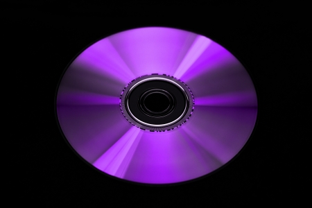 Digital Versatile Disk isolated on black backgroundの写真素材