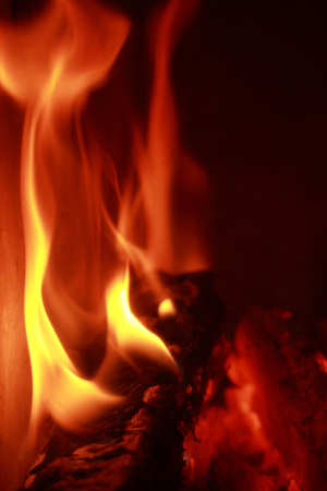 Fire flames with reflection on black background