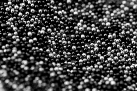 Pile black and silver balls of bead suitable for Background and textureの写真素材