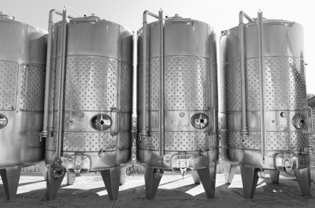 Modern aluminum barrels where grape juice is aged into wineの写真素材