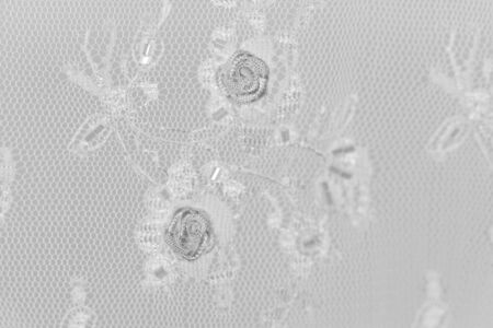 Beautiful lace with flower pattern - macro photo