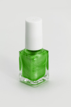 Colorful nail polish - white background, green styleの写真素材