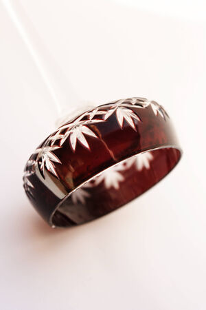 Transparent marbles in a red cristal glass