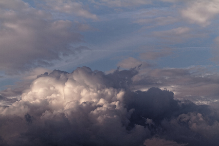 Landscape of the sun behind the cloudsの写真素材