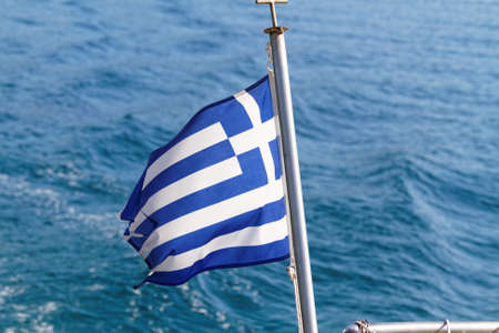 Photo of the Greek flag on the shipの写真素材
