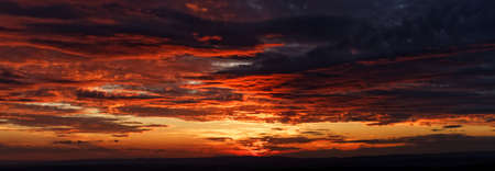 Photo of the beautiful sunset and the wonderful cloudsの写真素材