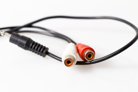 Close up photo of a RCA cable with withe background