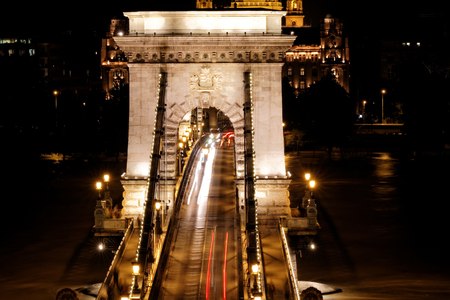 Public transport on the Suspension Bridge at night in Budapestのeditorial素材