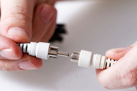 Close up photo of a RCA cable with withe background