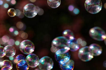 The rainbow bubbles from the bubble blowerの写真素材