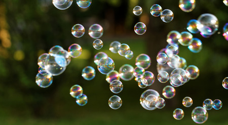 The rainbow bubbles from the bubble blowerの写真素材