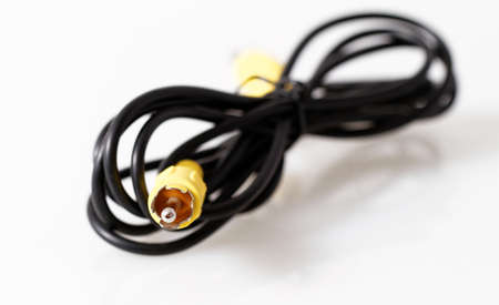 Close up photo of a RCA cable with withe backgroundの写真素材