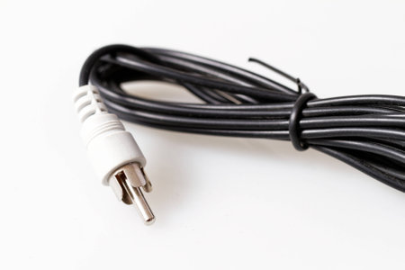 Close up photo of a RCA cable with withe backgroundの写真素材