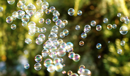 The rainbow bubbles from the bubble blowerの写真素材
