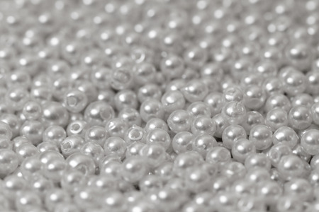 Pile of pearl on the white backgroundの写真素材