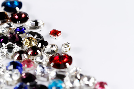 Large crystal strasses on a white background - macro photo