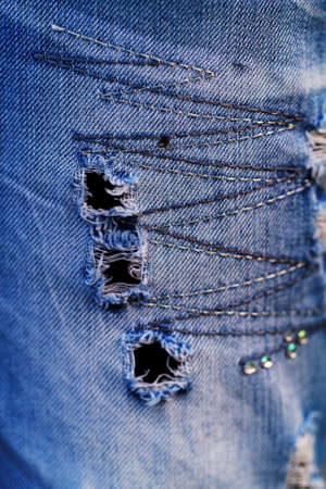 Fashion jeans design - closeup picture of a part of the jeansの写真素材