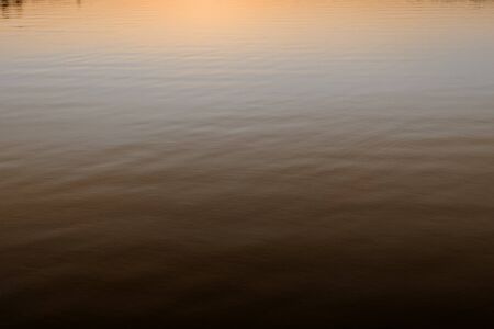 Photo of a calm lake in duskの写真素材