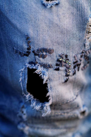Fashion jeans design - closeup picture of a part of the jeansの写真素材