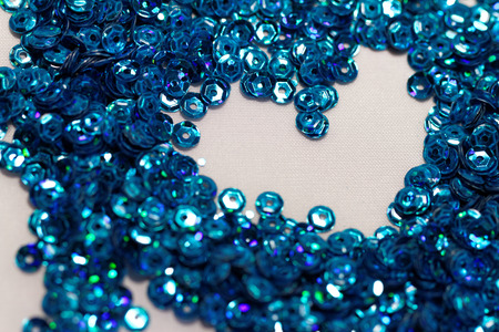 Close up photo lots of blue sequinの写真素材