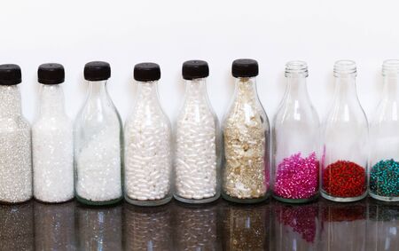 Lot of pearl equipment in small bottlesの写真素材