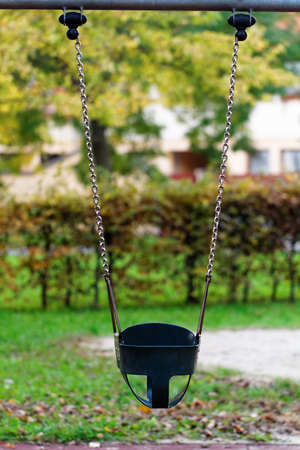 Photo of a child swing in the parkの写真素材