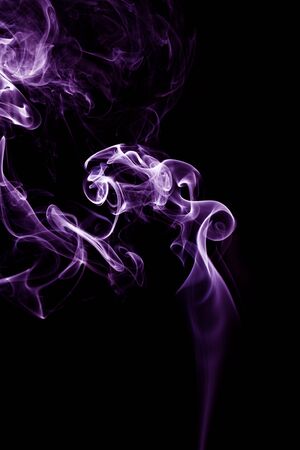Beautiful smoke on the black background - macro photoの写真素材