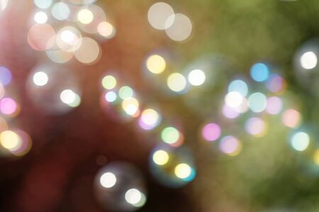 Colorful abstract blurred background with bokeh lightsの写真素材