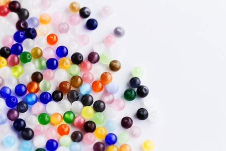 Shining multicolored beads - close up photoの写真素材