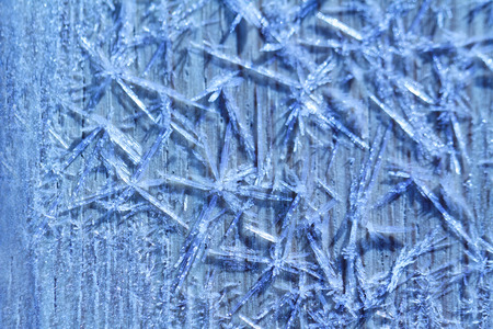 Morning frost on a wooden table - macro pictureの写真素材