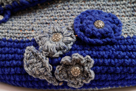 Gray and blue crochet flowers - macro photoの写真素材