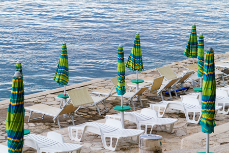 Striped beach umbrella on the beach - Croatiaの写真素材