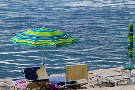 Striped beach umbrella on the beach - Croatiaの写真素材