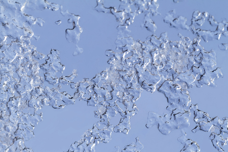 Natural ice and water drops on glass backgroundの写真素材