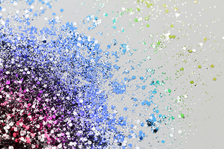 Color glitter on light background