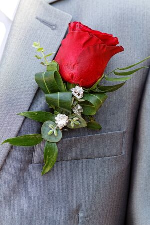 Wedding boutonniere on suit of groom - wedding flower