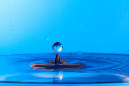 Blue water drop splashingの写真素材