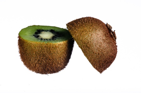 A sliced kiwi against a white backgroundの写真素材