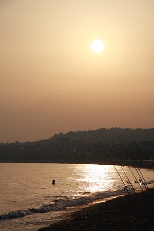 Sunset at the city beachfront of Nice, France.の写真素材
