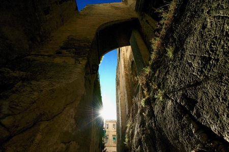 Sun trough the passage between the old stone wallsのeditorial素材