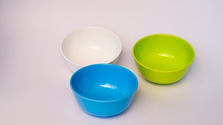 colorful melamine ware bowl with isolated on whiteの写真素材