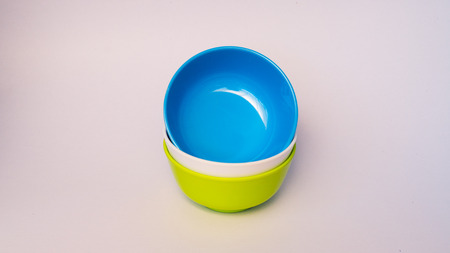 colorful melamine ware bowl with isolated on whiteの写真素材