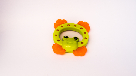 green frog ruuber toy for baby bite with isolated on whiteの写真素材