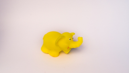 yellow elephant ruuber toy for baby bite with isolated on whiteの写真素材